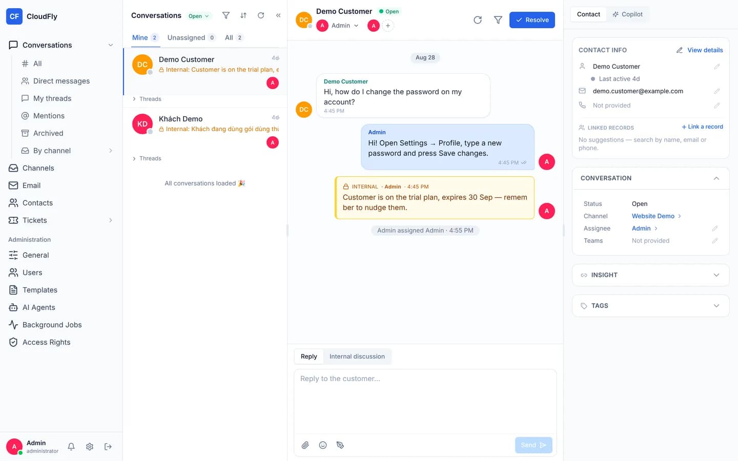The CloudFly Helpdesk console in three columns: navigation on the left, the Conversations queue in the middle, an open message timeline and the contact panel on the right