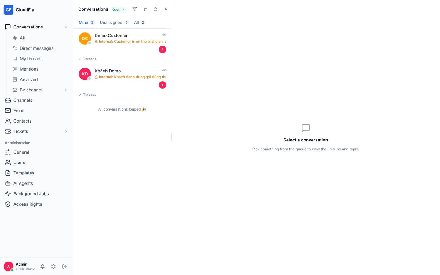 The screen straight after signing in: navigation on the left, a queue listing two demo conversations, and an empty right-hand area reading Select a conversation