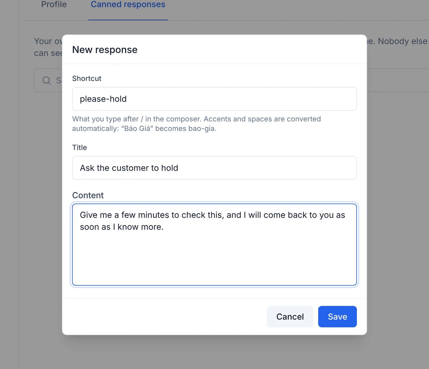 The New response dialog with please-hold in the Shortcut box, Ask the customer to hold in the Title box and a short reply in the Content box